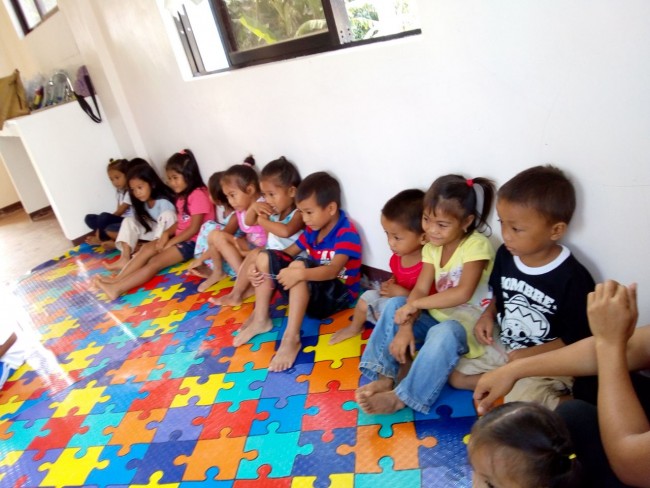 Children on mats