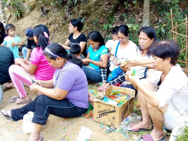 Mothers making decorations