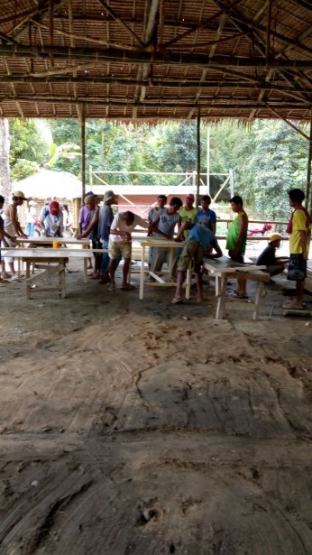 Men making tables