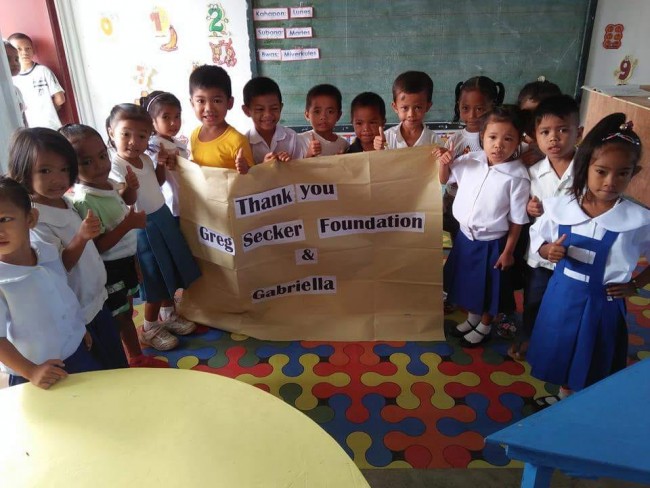 The Children love their new tables at Capinahan School.