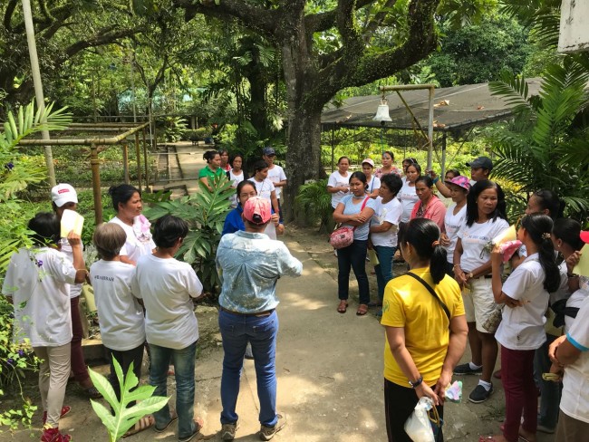 Thirty GSF Village beneficiaries attend a seminar on plant propagation.