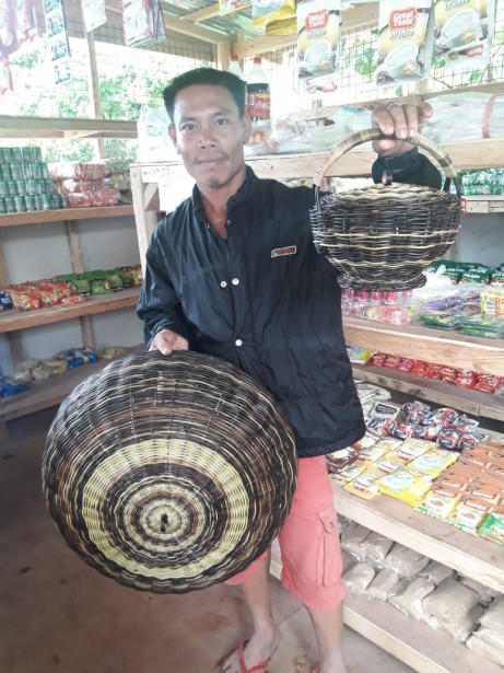 Cherwin Pamplona weaves “Nito” baskets and food covers.
